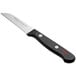 A Wusthof Gourmet paring knife with a black handle.