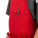 a person wearing a red apron