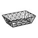 An American Metalcraft black wire rectangular basket with a spiral design on the counter.