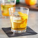 a close up of a glass of liquid
