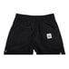 A pair of black Chef Revival cargo pants with a white logo on the side.