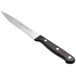 A Wusthof utility knife with a black handle and red dots.