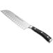 A Wusthof Classic Ikon Santoku knife with a black handle.