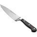 A Wusthof Classic cook's knife with a black handle.