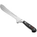 A Wusthof Classic butcher knife with a black handle.