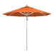 A California Umbrella with a Sunbrella Tuscan canopy on a metal pole.