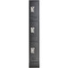 A black metal Regency locker with three compartments.