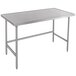 A Advance Tabco stainless steel work table with an open base.