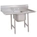 An Advance Tabco stainless steel one compartment sink with two drainboards.