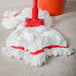 A Carlisle white microfiber looped end wet mop head.