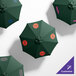 A customizable California Umbrella with a forest green Sunbrella canopy.