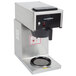 A silver Bloomfield pourover coffee maker with a black tray.