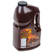 a plastic jug of barbecue sauce