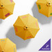 A top view of a customizable yellow California Umbrella with Sunbrella Sunflower Yellow fabric.