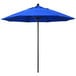 A California Umbrella ALTO 9' round outdoor umbrella with a Pacific Blue Sunbrella canopy and black aluminum pole.