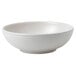 A white Dudson stoneware rice bowl with a curved edge.