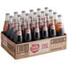 A white box of Sidral Mundet Apple Soda bottles.