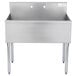 A stainless steel Advance Tabco commercial sink with two holes and two legs.