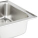A close-up of a stainless steel water pan for a chafer.