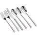 A group of Acopa stainless steel dinner knives.