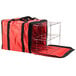 a red and black bag with metal racks