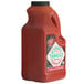 A large plastic jug of TABASCO® Scorpion Hot Sauce.