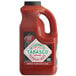 A 64 oz. bottle of TABASCO® Scorpion Hot Sauce with a red cap and label.