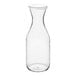 A clear polycarbonate carafe with a white flat lid.