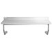 A Regency stainless steel wall mounted table with a stainless steel shelf and legs.