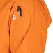 a person wearing an orange uniform