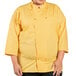 a person wearing a yellow chef coat