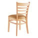 A Lancaster Table & Seating wooden restaurant chair with a light brown vinyl cushion on the seat and a ladder back.