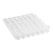 A white plastic gravity feed bottle organizer with 7 lanes.