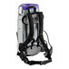 The black and grey back of a ProTeam Flex cordless backpack vacuum with a black strap.