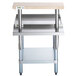 A Regency stainless steel equipment stand with a galvanized undershelf and wooden cutting board on a shelf.