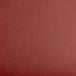 A burgundy vinyl Lancaster Table & Seating bar stool seat on a white background.