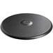 A black circular object with a hole in the center.