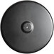 A black circular Lancaster Table & Seating Excalibur outdoor table base plate with a hole in the center.