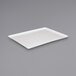 A white rectangular tray on a gray background.