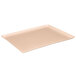 A peach rectangular fiberglass dietary tray.
