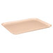 A peach rectangular fiberglass cafeteria tray.