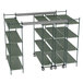 A close-up of a metal shelving unit with wheels.