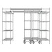 A chrome Metro top-track shelving unit with wheels.