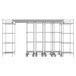 A Metro chrome top-track shelving unit with wheels and shelves.