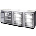 A stainless steel Continental Back Bar Refrigerator with three glass doors.