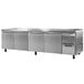 A Continental Refrigerator stainless steel worktop refrigerator with three doors.