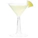 A Fineline Flairware plastic martini glass with a clear base filled with a yellow liquid and a lime wedge.