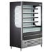 A black and silver Beverage-Air VueMax air curtain merchandiser with glass doors.