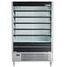 A Beverage-Air VueMax black air curtain merchandiser with shelves inside.