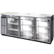 A stainless steel Continental Back Bar refrigerator with three glass doors.